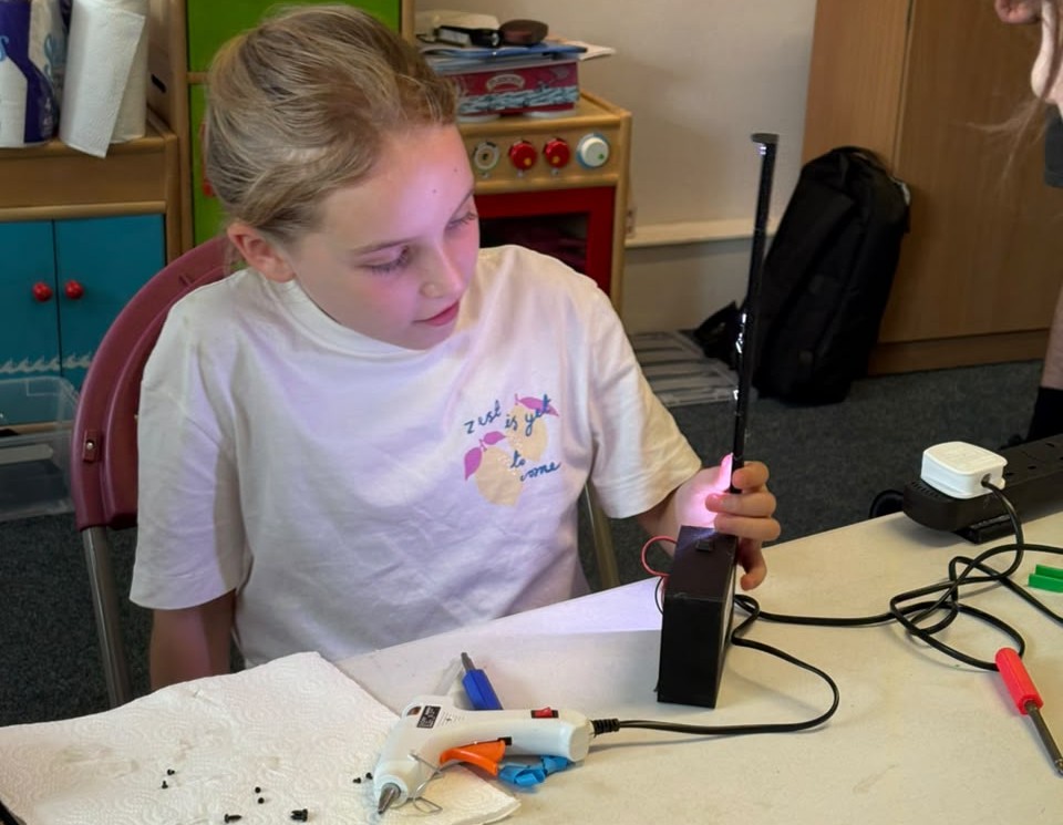Girl building her Linvaders set